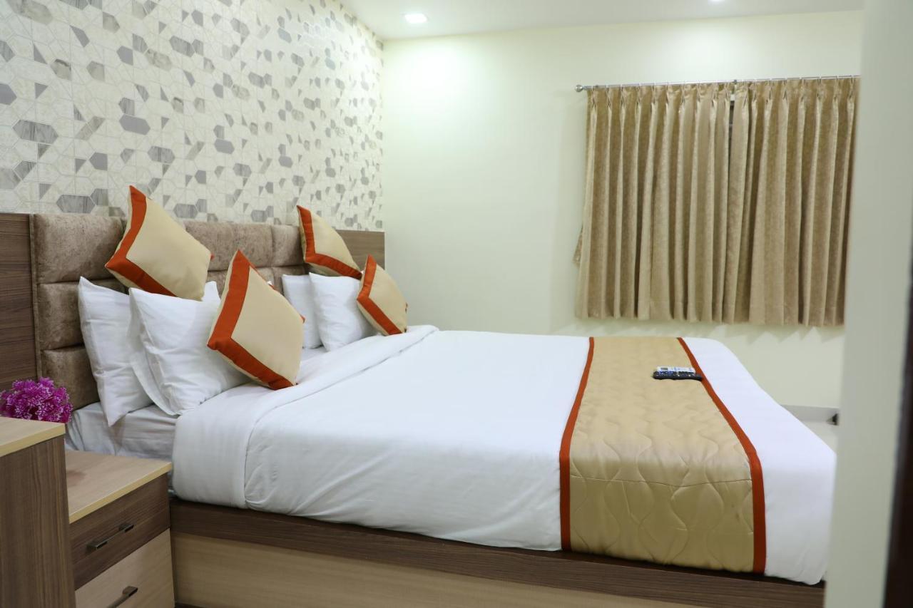 Hotel 8Th Mile Suites Bangalore Exterior photo