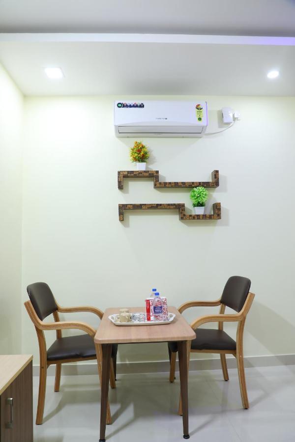 Hotel 8Th Mile Suites Bangalore Exterior photo